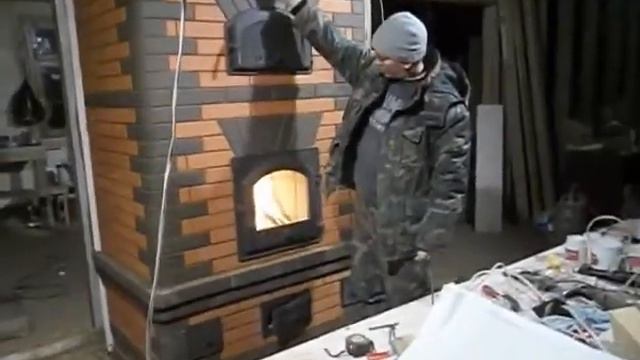 каминопечь в режиме камина.