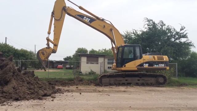 Caterpillar 325DL смотреть онлайн