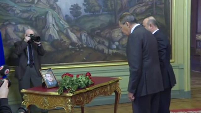 Cavusoglu, Lavrov lay flowers at portrait of slain envoy смотреть онлайн