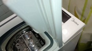 Midea.Стук барабана.Вертикальная стиральная машина