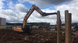 Работа экскаватора с вибропогружателем