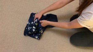 Как сложить детский комбинезон