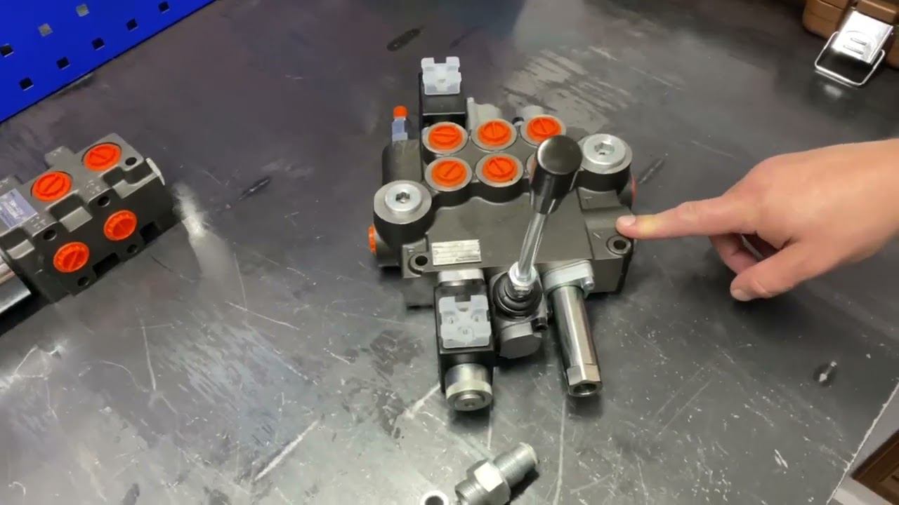 Штуцер последовательного соединения гидрораспределителей Р40 Р80 РС100 Р120. Применение