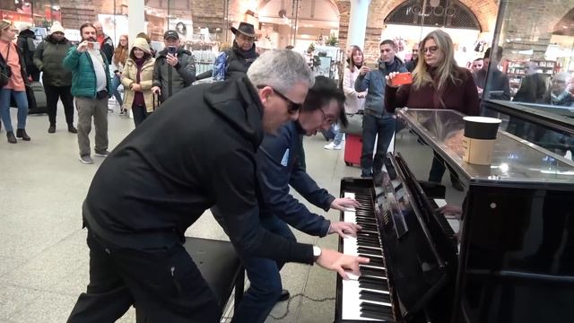 Epic Piano Battle Brings Crowd To A Standstill