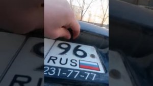 Замена лампочки подсветки заднего гос. номера Опель Астра j универсал