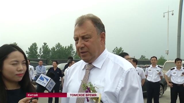 В китайской провинции Хубэй встретили первую партию пиломатериалов из Томской области смотреть онлайн