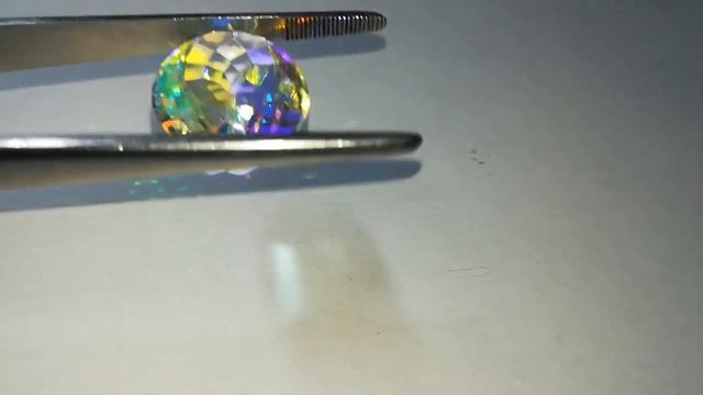 Натуральный радужный кварц 34.35 Ct Сертификат смотреть онлайн