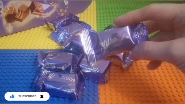 Новогодний подарок от Milka Mini Choco Bite! ? Что внутри! ? смотреть онлайн