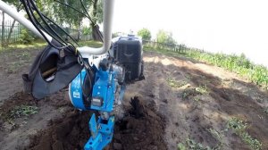 Роторный окучник