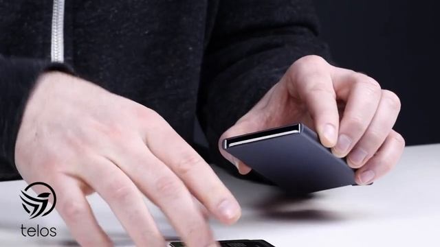 Алюминиевый кардхолдер с RFID защитой от сканирования карт смотреть онлайн