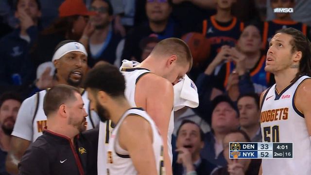 Nikola Jokic in serious pain after poked in the eye and Knicks crowd cringes смотреть онлайн