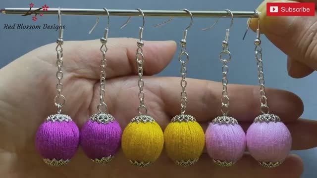 серьги из бусины и ниток