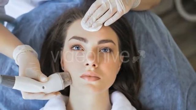 Young Woman Getting Radio Frequency Lifting Procedure in a Beauty Salon | Stock Footage - Videohive смотреть онлайн