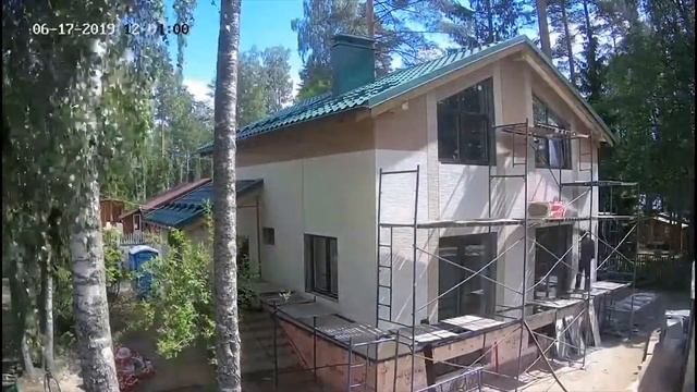 Обшивка дома японскими панелями KMEW