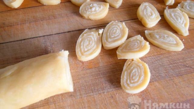 Soup With Cheese Rolls Of Dough And Chicken