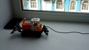 Обзор бульдозера на гусеницах и радиоуправлении