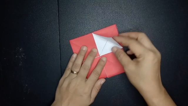ORIGAMI PHOTO FRAME MADE OF COLORED PAPER FOR DECORATION