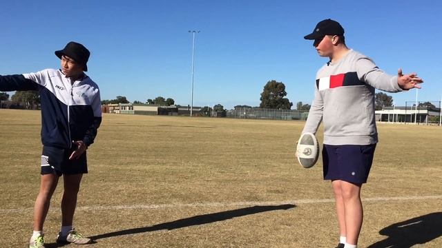 Aussie teaches Asian how to play footy смотреть онлайн