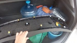 Снятие (съем, демонтаж) пластиковой обшивки багажника (5-й двери) Киа Рио III хэтчбек