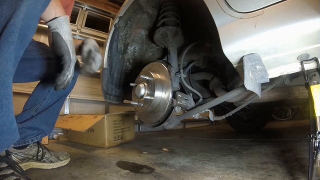Kia Spectra - Rear Lug Studs, Rotors, And Pad Replacement