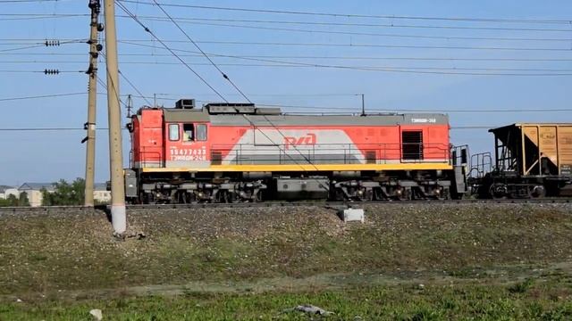 Тепловоз ТЭМ18ДМ-248 с хоппрами-дозаторами. смотреть онлайн
