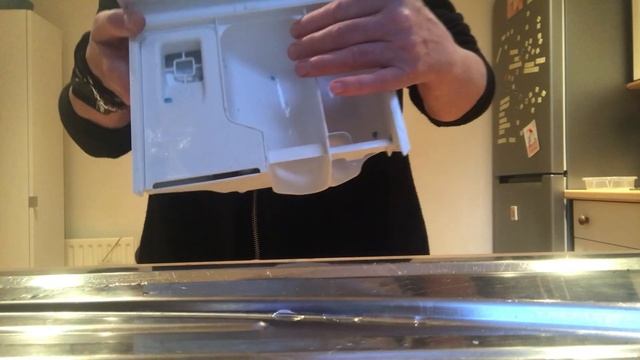 How To Remove The Detergent Drawer On An Indesit Washing Machine