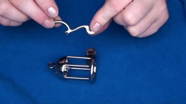 Impaler chastity device for Reverse Prince Albert piercing wearers