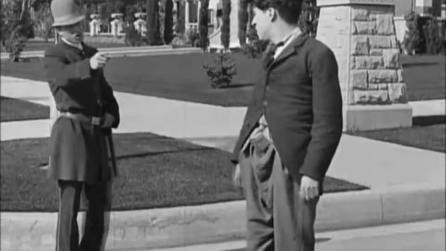 Charlie Chaplin - Between Showers 1914