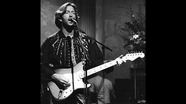 Eric Clapton Performs 'Pretending,' Live In 1990.
