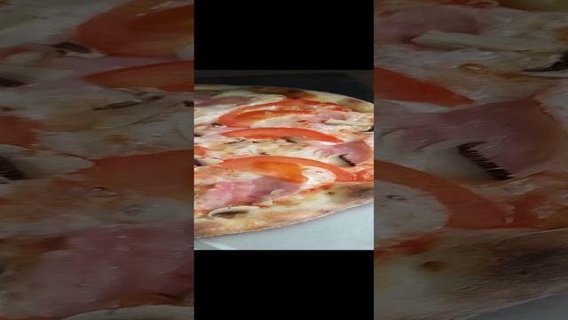 Пицца Аппетитная с томатами. смотреть онлайн