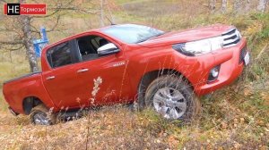 Toyota Hilux против Mitsubishi L200 на бездорожье.