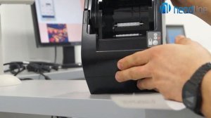 Замена чековой ленты в кассовом аппарате