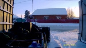 Мотобуксировщик на уборке снега.