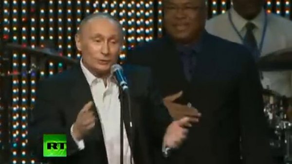 The coolest president Vladimir Putin playing piano and singing at a charity fundraiser.