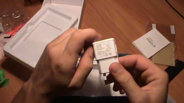 Распаковка: Doogee Pixels DG 350 и чехол для Xiaomi Redmi Note смотреть онлайн