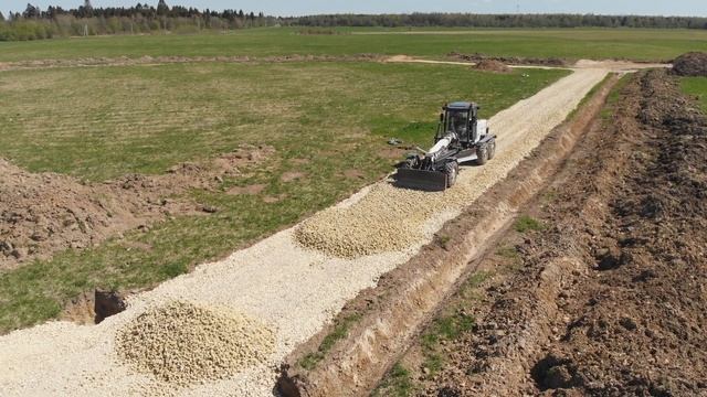 Как работает автогрейдер ГС 14.02. Профилирование дороги смотреть онлайн