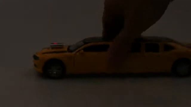 Модель автомобиля Chevrolet Camaro удлиненная желтая, металлическая, 1:32, музыка и свет смотреть онлайн