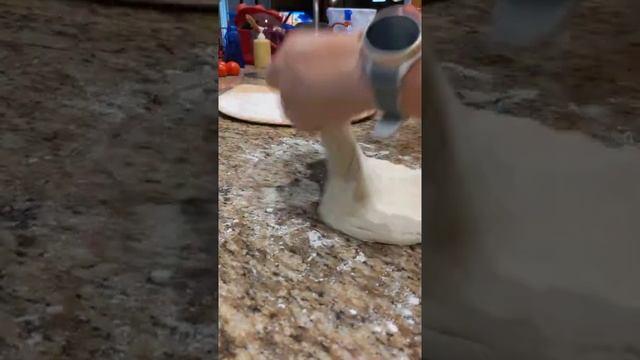 Stretching the Pizza Dough Before Building Your Pizza on the Wooden Peel смотреть онлайн