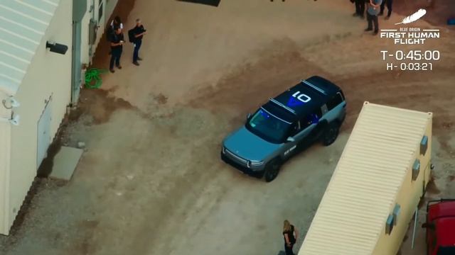 Jeff Bezos and crew drive in Rivian EV to launch pad смотреть онлайн