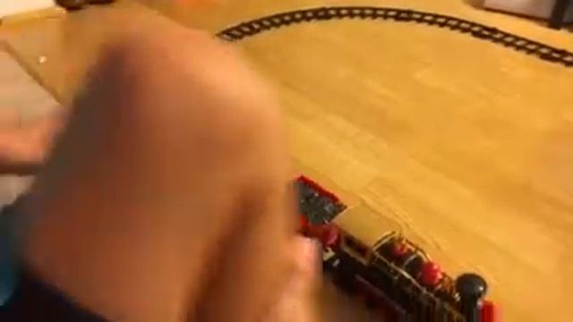 Playing with a toy train смотреть онлайн