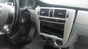 Как снять центральную панель магнитолы Лачетти