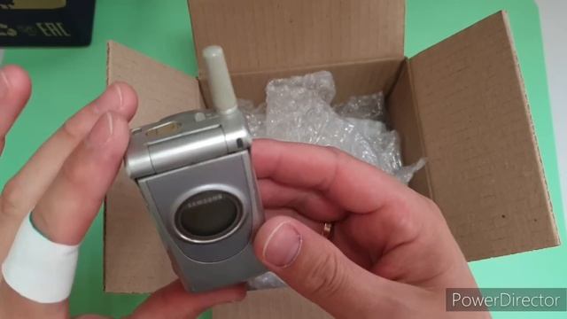 Распаковка двух больших посылок с телефонами Nokia 7610, NEC N412i, Nokia 603. смотреть онлайн