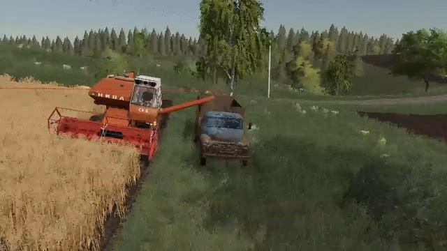 Разгрузка комбайна и доставка урожая на элеватор с помощью «AutoDrive» для Farming Simulator 19. смотреть онлайн
