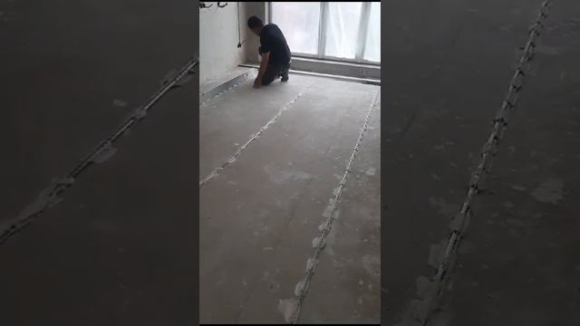 Монтаж маяков для наливного пола.