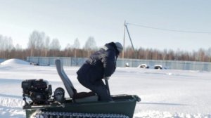Гусеничный минитрактор по глубокому снегу