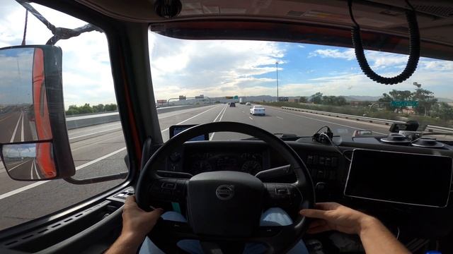 A city in the desert. POV driving through Phoenix, AZ. Volvo VNL 860. смотреть онлайн