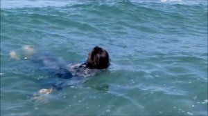 Wetlook office clothes at beach