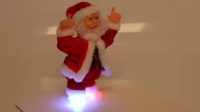 Дед Мороз музыкальный 20 см, танцует смотреть онлайн