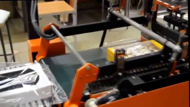 Пакверк: ТМ-2А автоматическая упаковка кондитерских изделий в термоусадочную ПОФ пленку смотреть онлайн