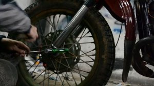 снятие переднего колеса с мотоцикла Урал.